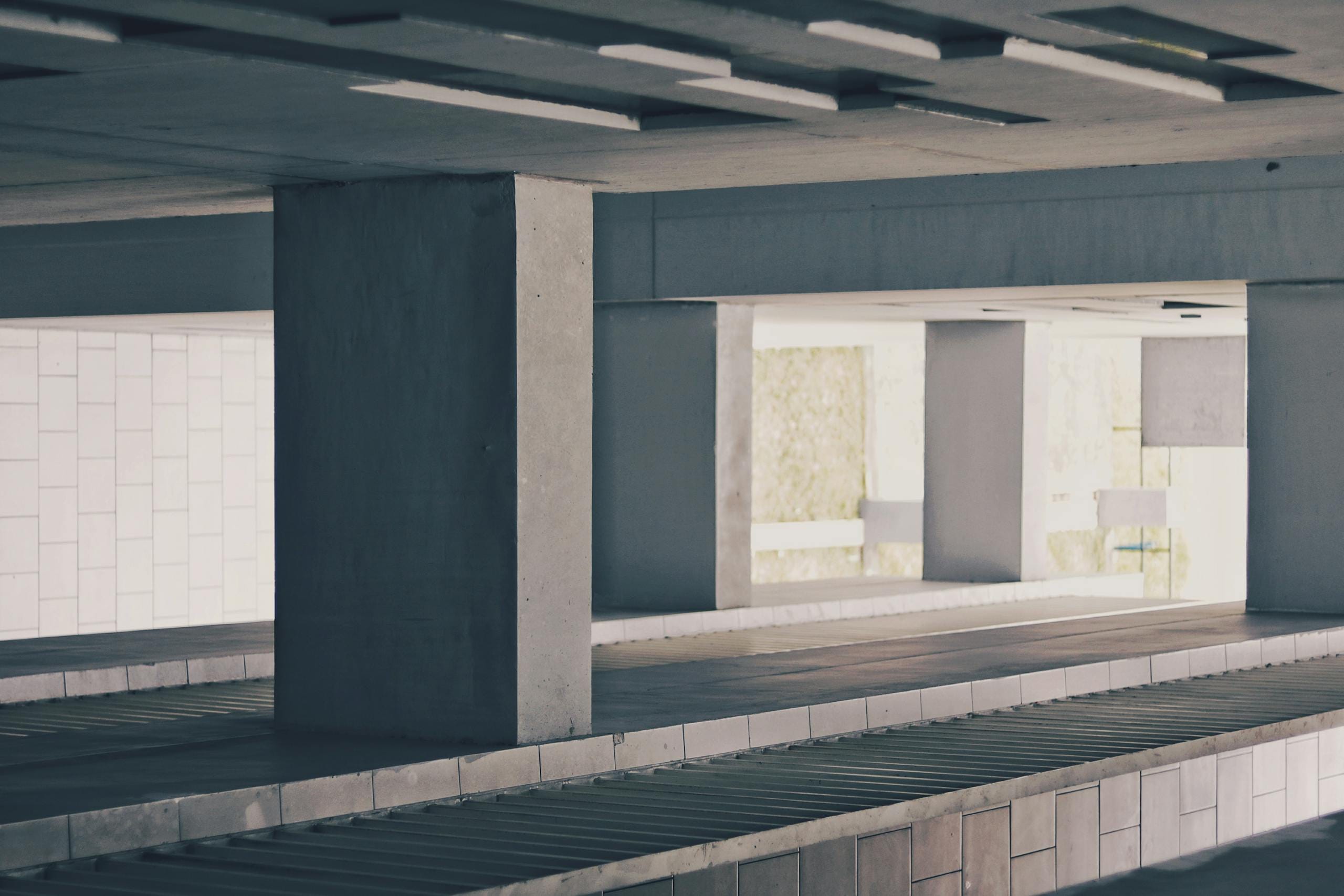 A contemporary multi-storey building showcasing minimalist architecture with ample natural light in Pinang, Indonesia.
